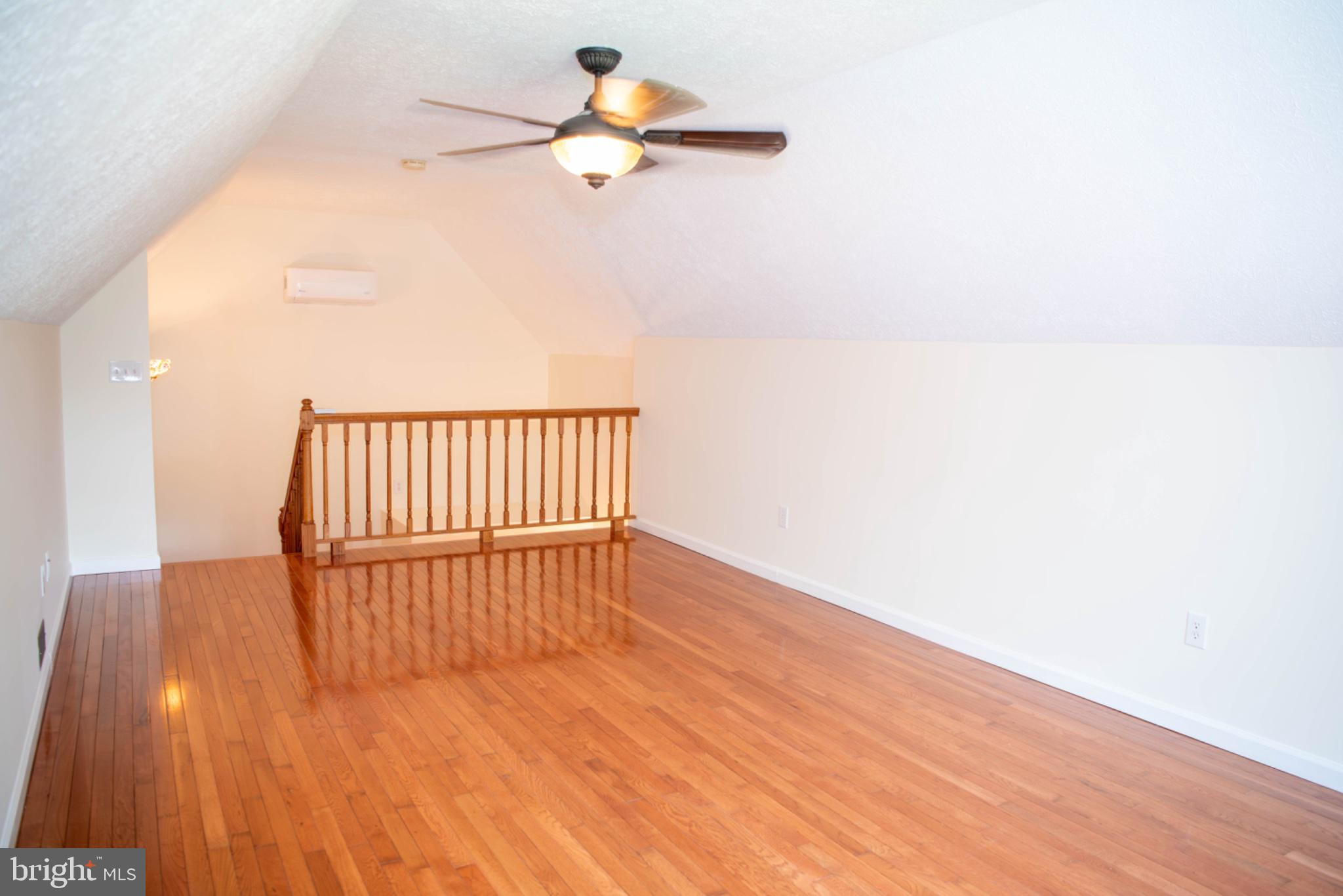 792 Forest Glen Road Moorefield, WV 26836 - Photo 106 of 146 Spacious attic retreat with warm tones.