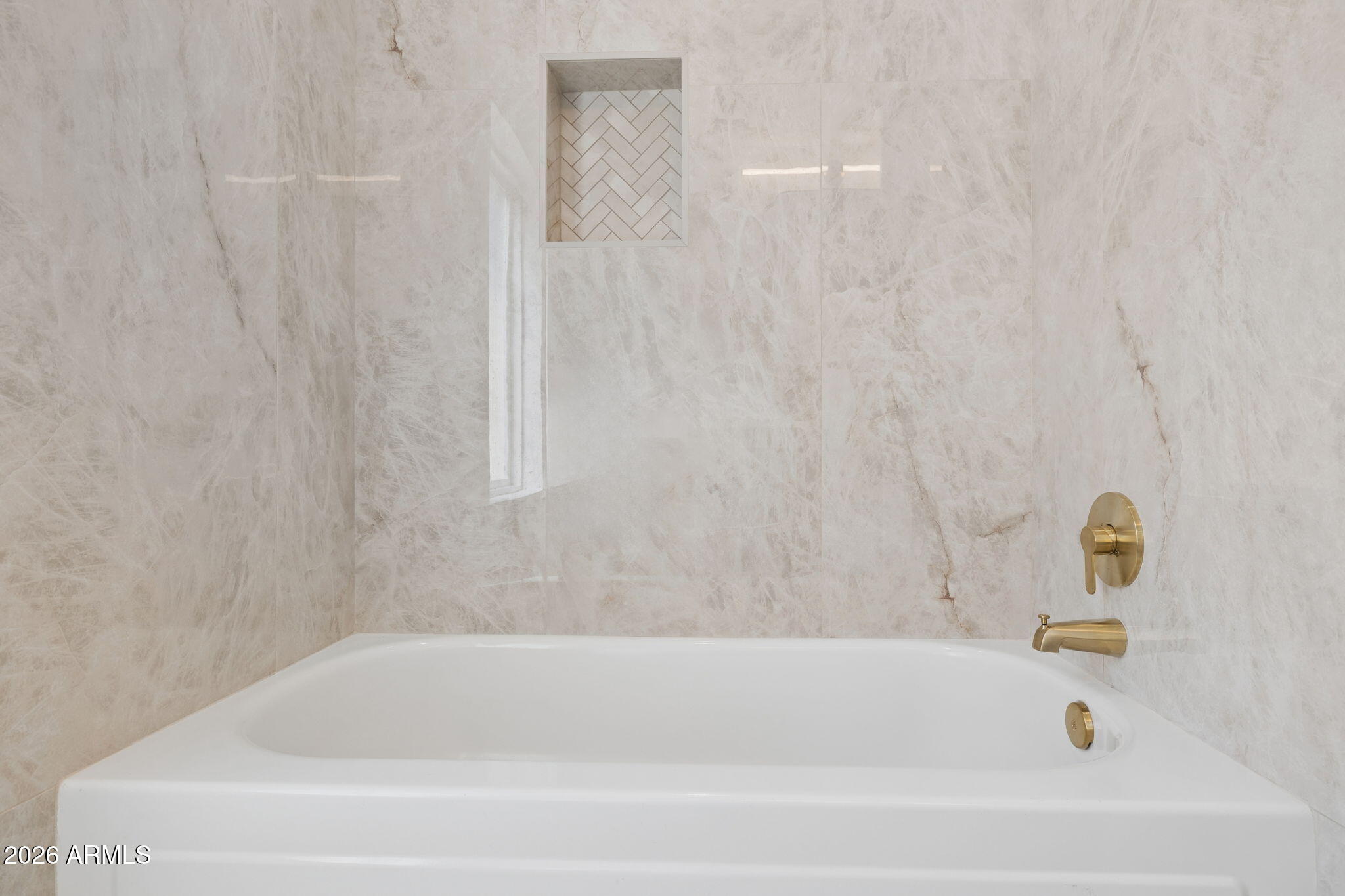 2451 East Dry Creek Road Phoenix, AZ 85048 - Photo 29 of 56 a bathroom with a bathtub