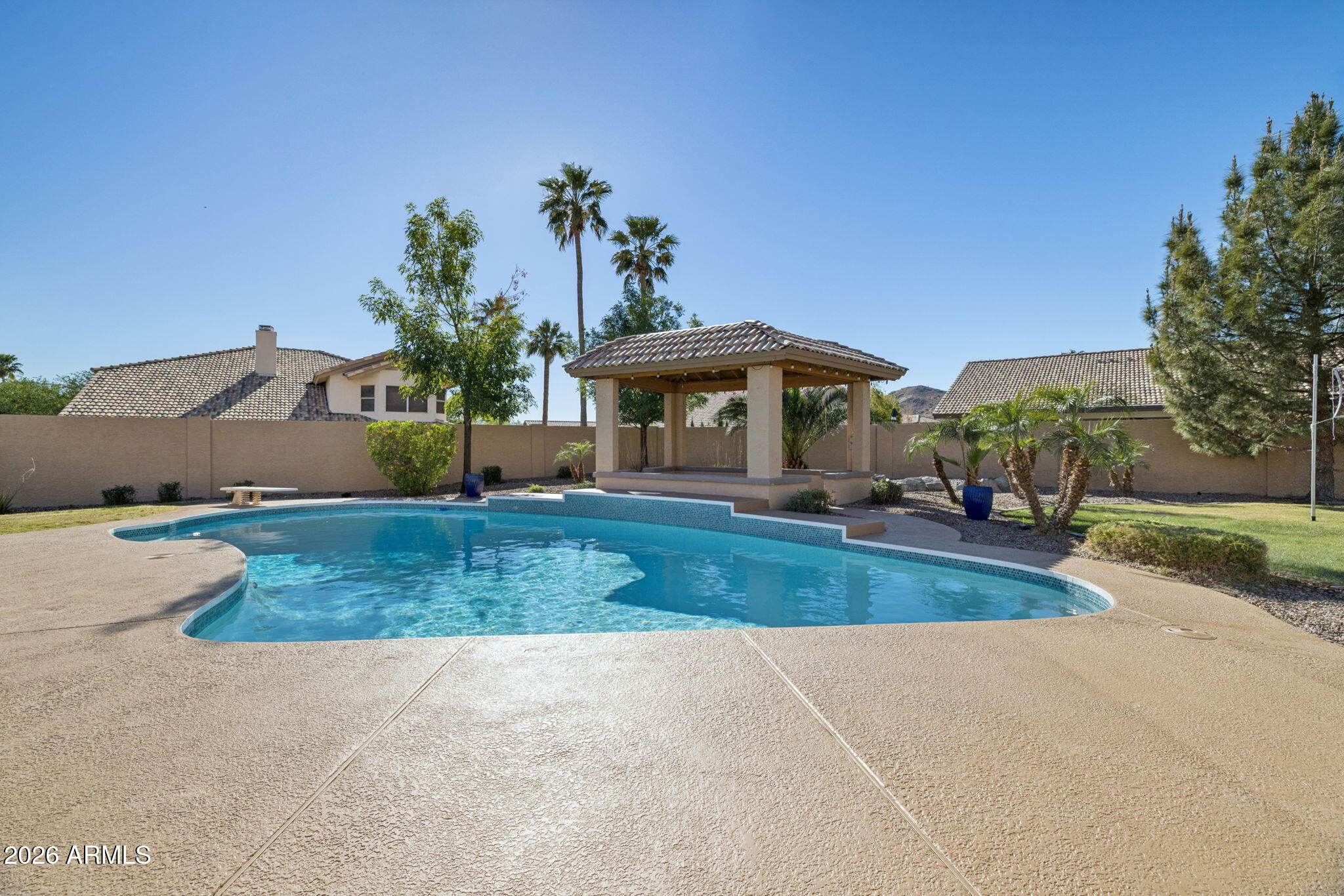 2451 East Dry Creek Road Phoenix, AZ 85048 - Photo 35 of 56 a view of a house with a yard