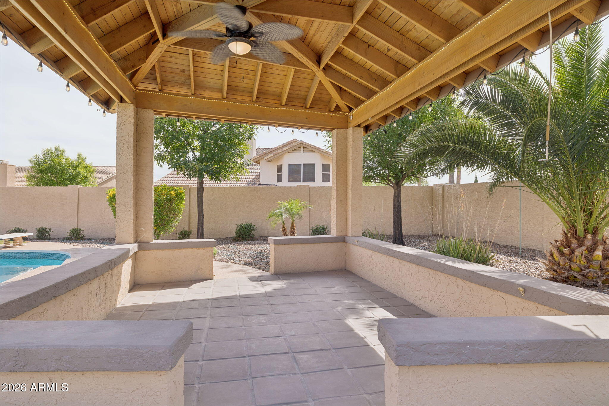 2451 East Dry Creek Road Phoenix, AZ 85048 - Photo 41 of 56 a view of a couches in patio of a house
