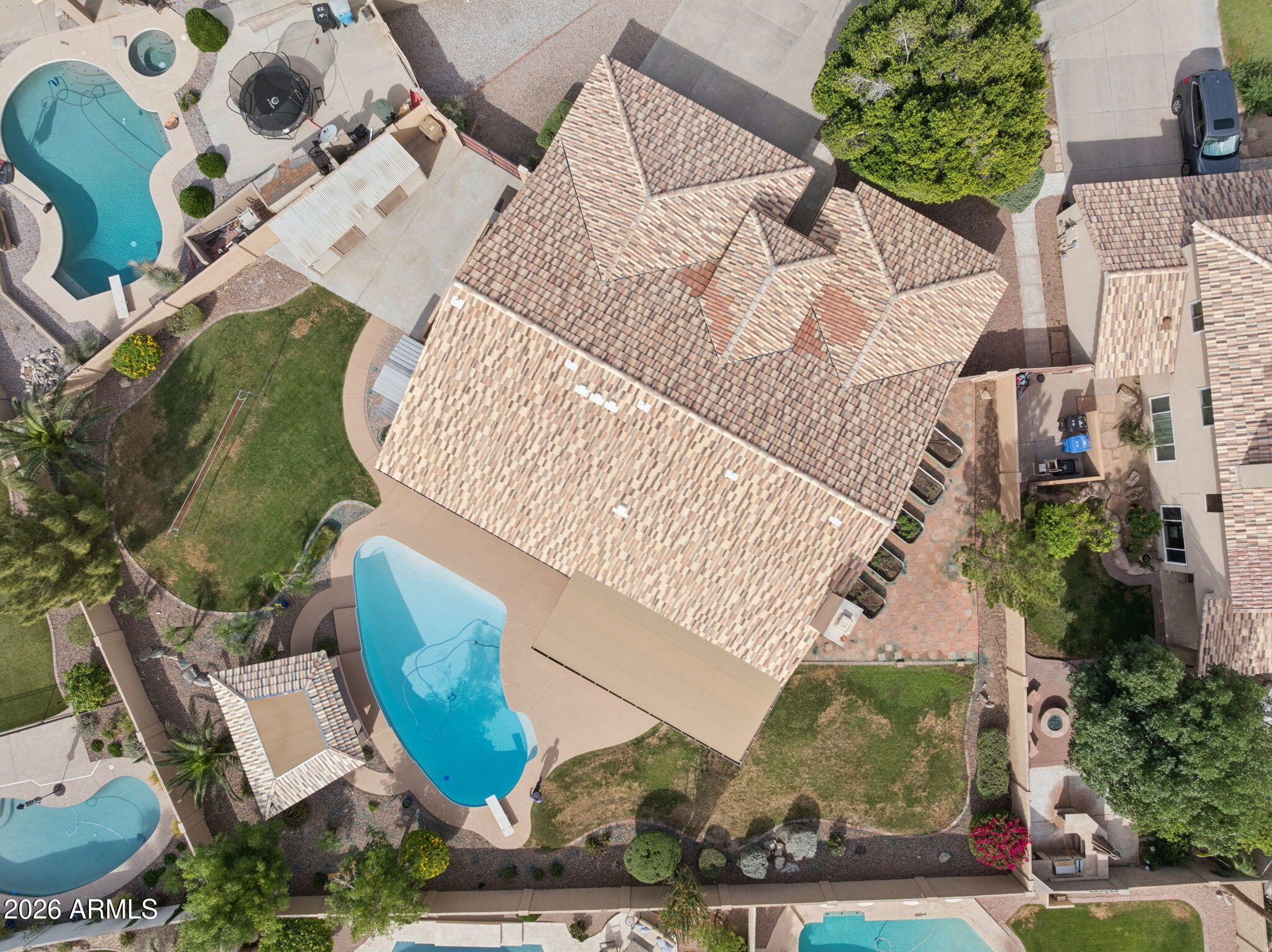 2451 East Dry Creek Road Phoenix, AZ 85048 - Photo 48 of 56 an aerial view of a house with garden space and street view