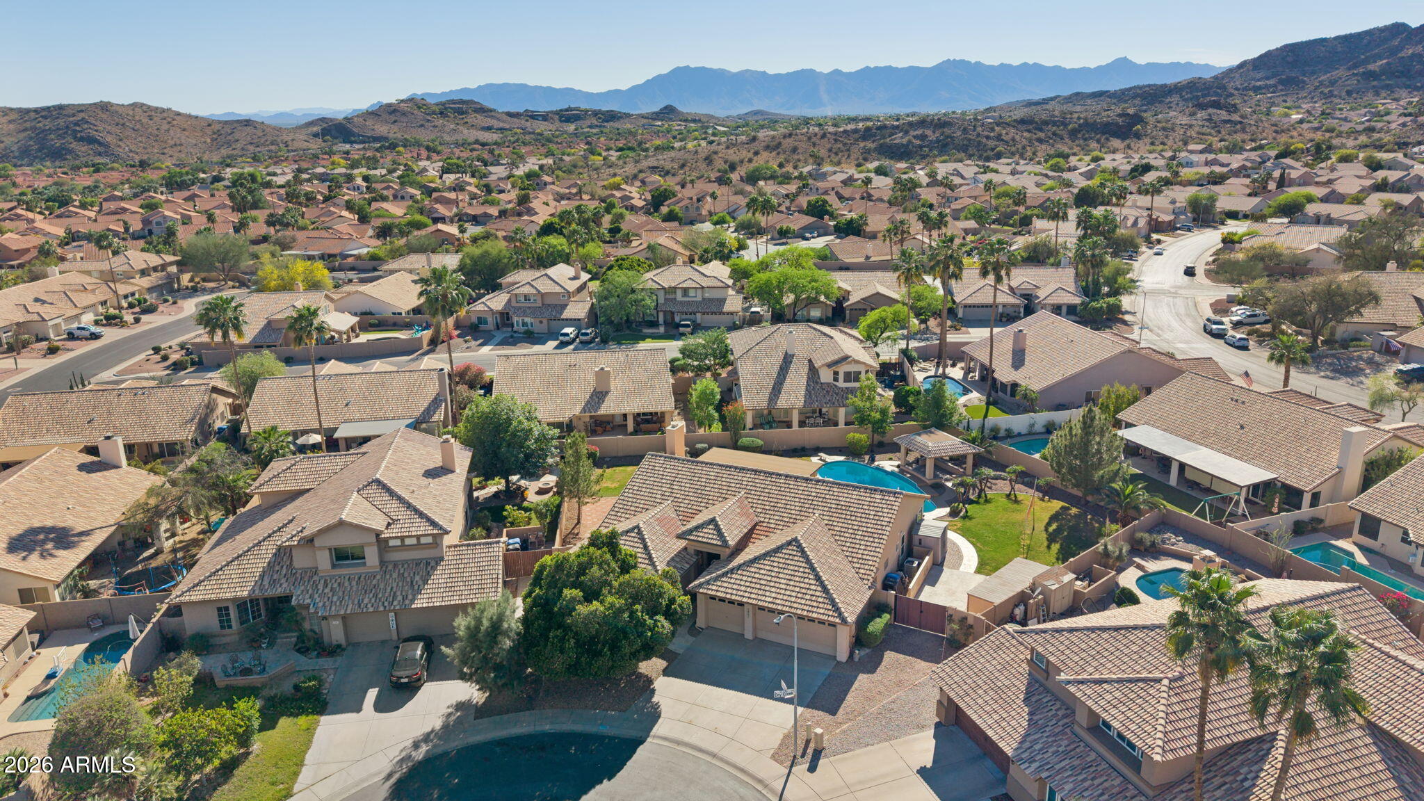 2451 East Dry Creek Road Phoenix, AZ 85048 - Photo 53 of 56 an aerial view of residential house with outdoor space and mountain view