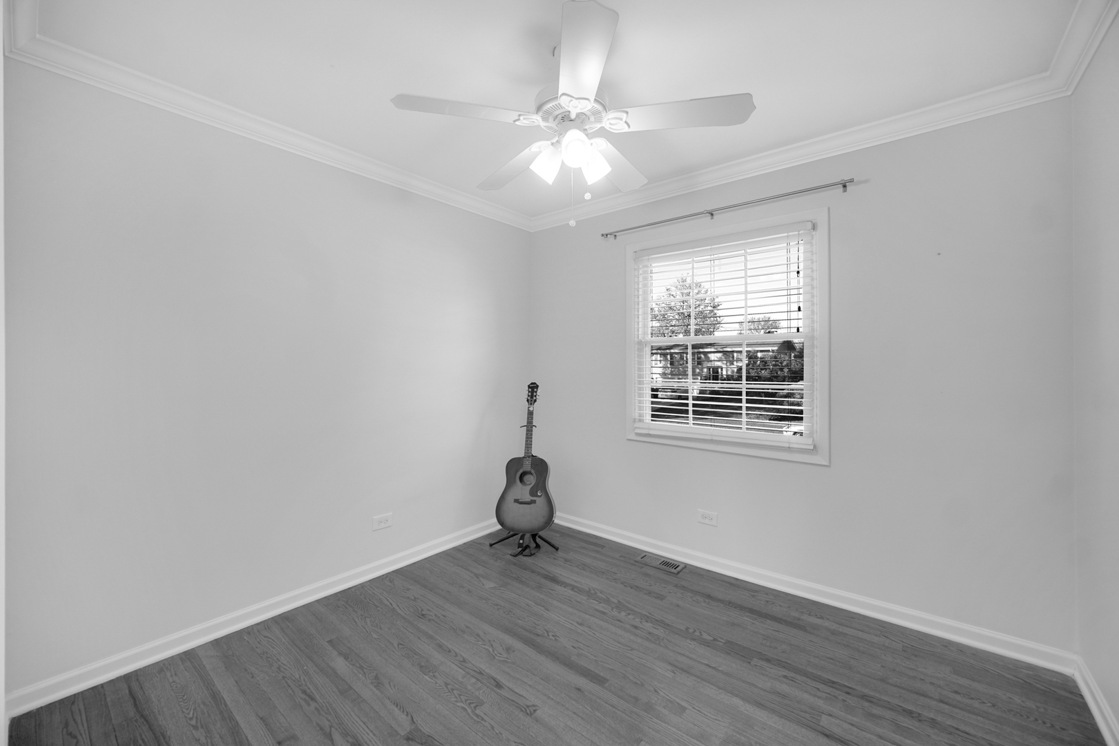 2S111 Churchill Lane Glen Ellyn, IL 60137 - Photo 23 of 34 wooden floor in an empty room with a window