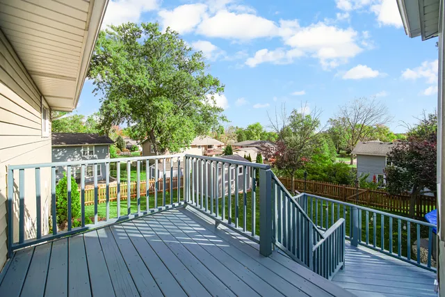 a view of a wooden roof deck