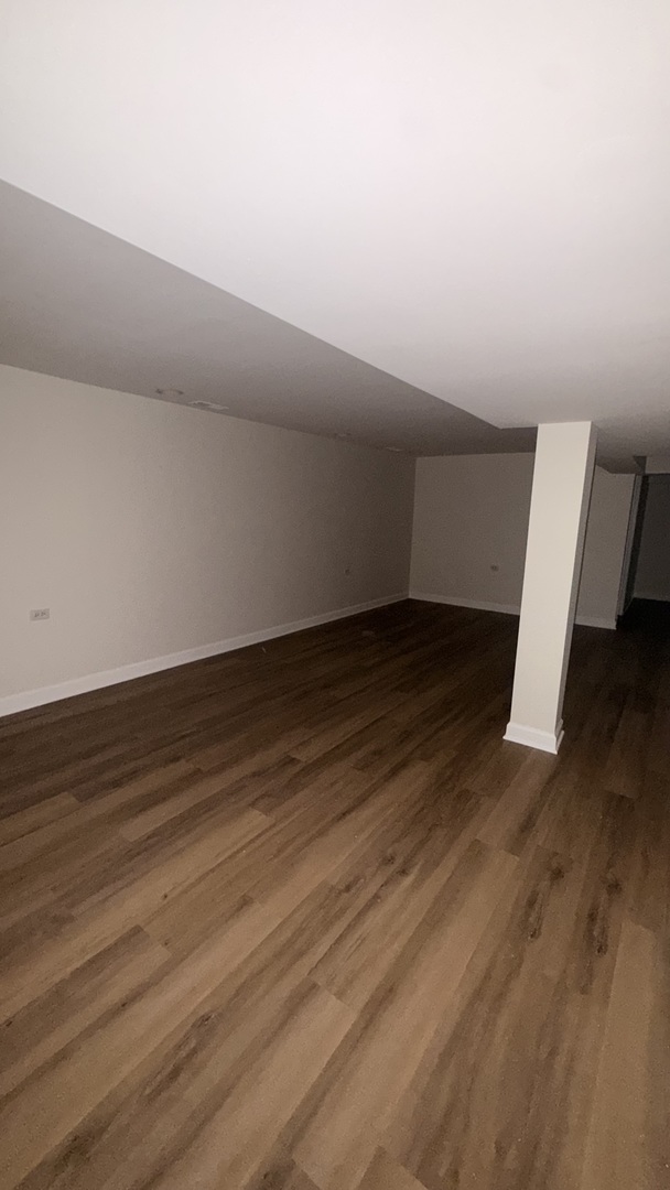604 Bayview Point, Unit 604 Schaumburg, IL 60194 - Photo 16 of 17 a view of wooden floor in an empty room