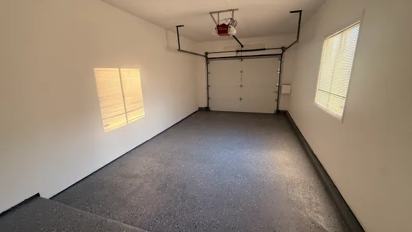 an empty room with windows