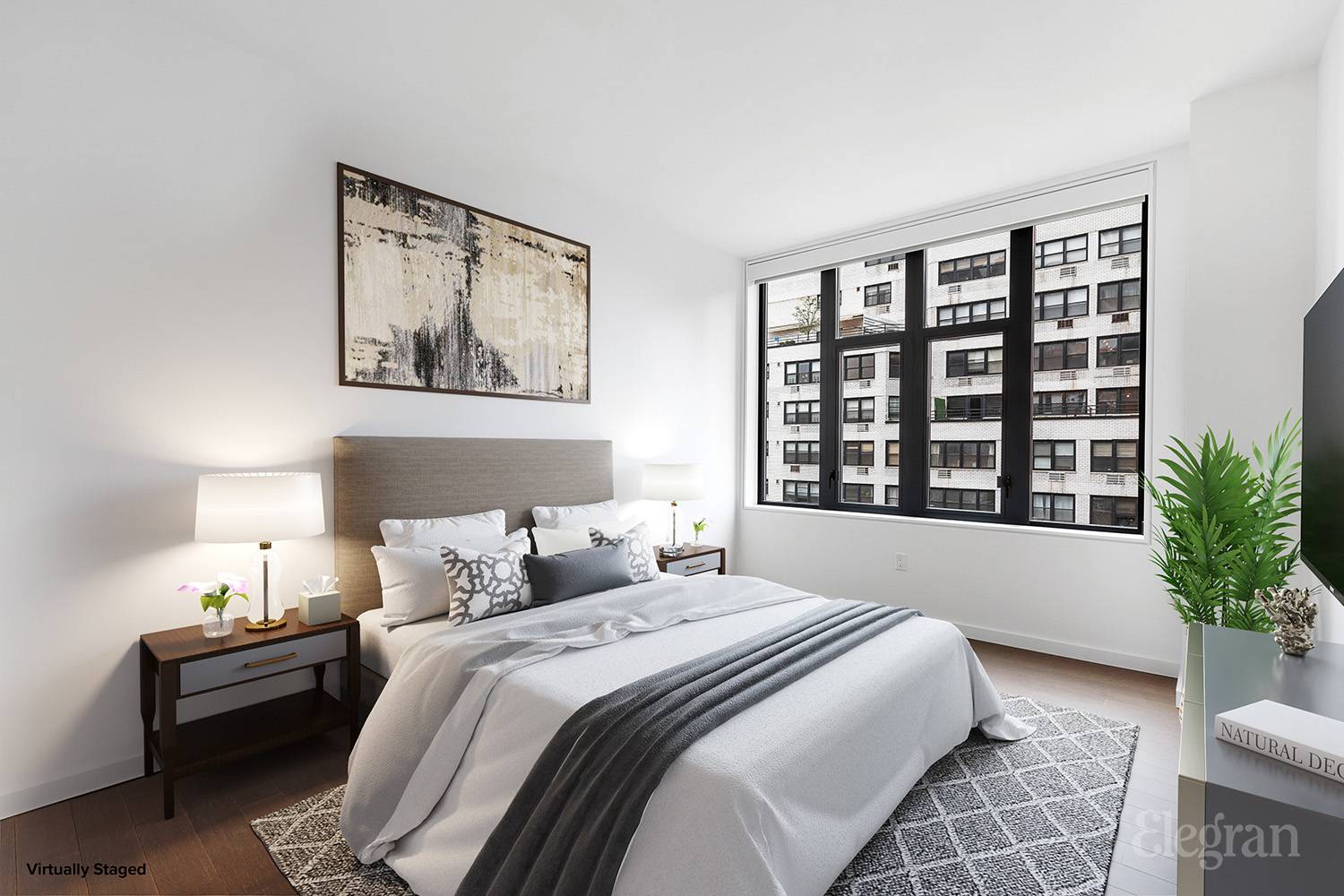 591 3rd Avenue, Unit 12A Manhattan, NY 10016 - Photo 6 of 14 a bedroom with a large bed and a potted plant