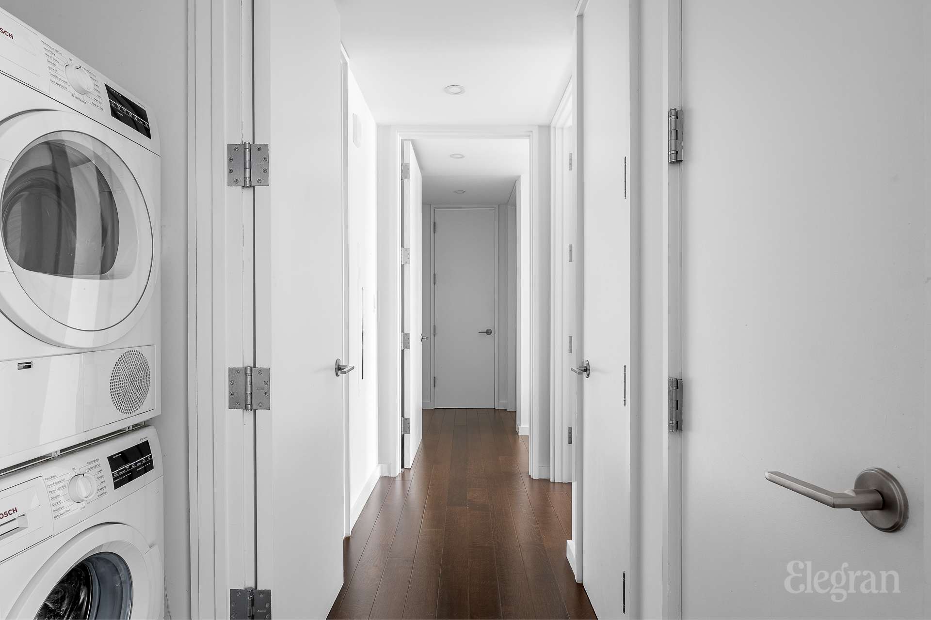 591 3rd Avenue, Unit 12A Manhattan, NY 10016 - Photo 8 of 14 a view of a livingroom with washer and dryer