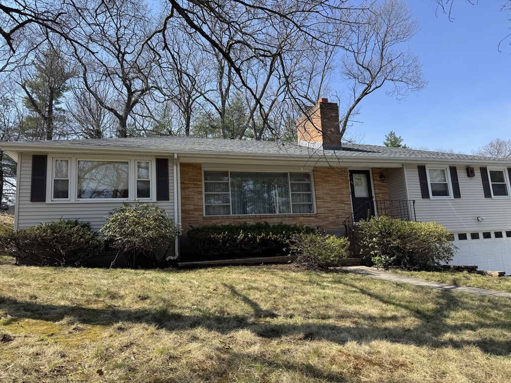 174 Forest Street Waltham, MA 02452 - Photo 14 of 15 front view of a house with a yard