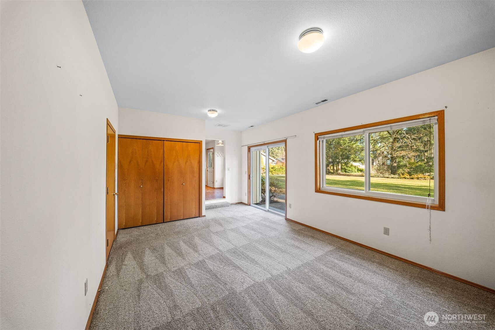 16011 Spanaway Loop Road South Spanaway, WA 98387 - Photo 13 of 35 a view of an empty room with a window