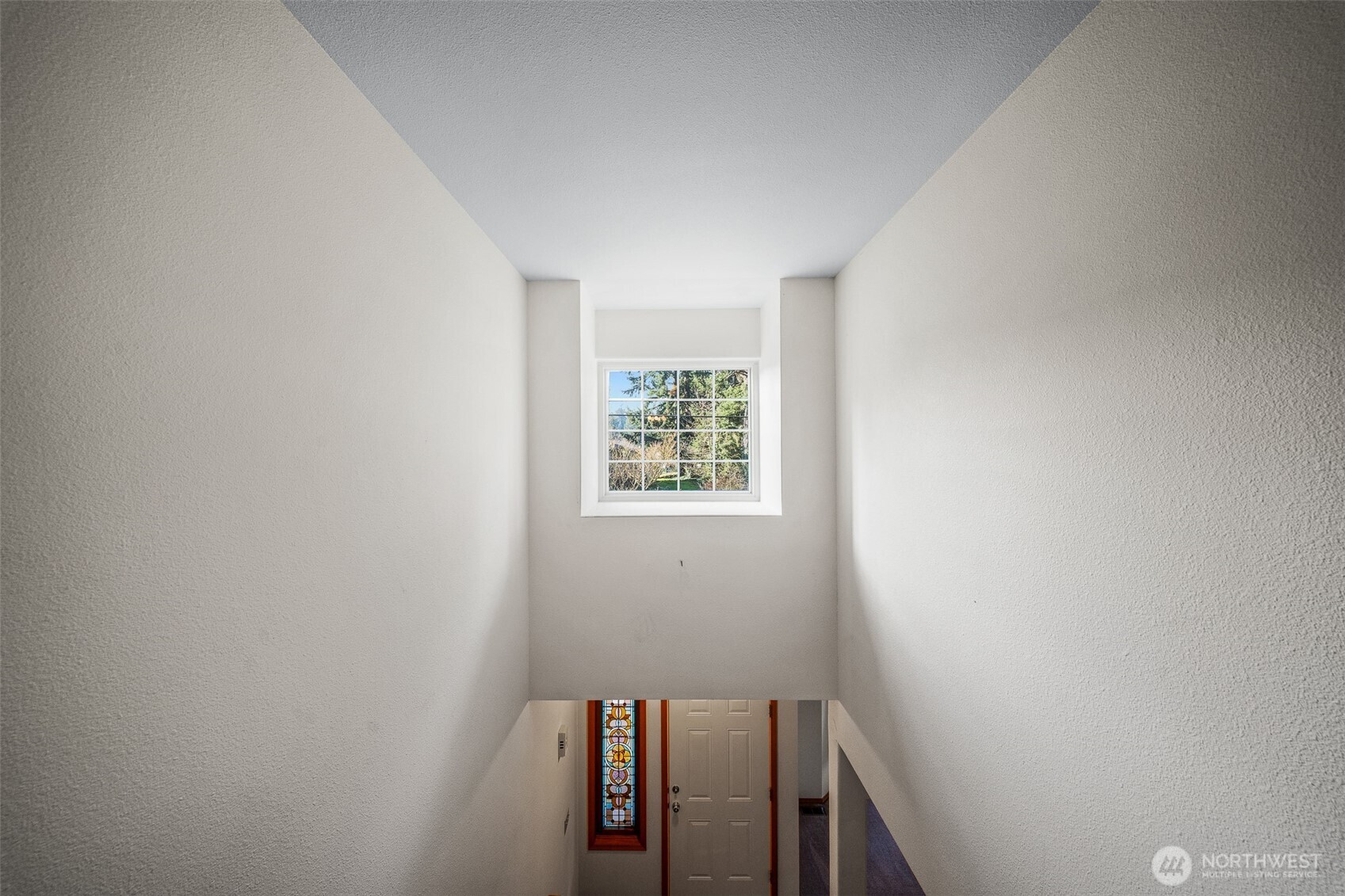 16011 Spanaway Loop Road South Spanaway, WA 98387 - Photo 15 of 35 a view of an empty room with windows