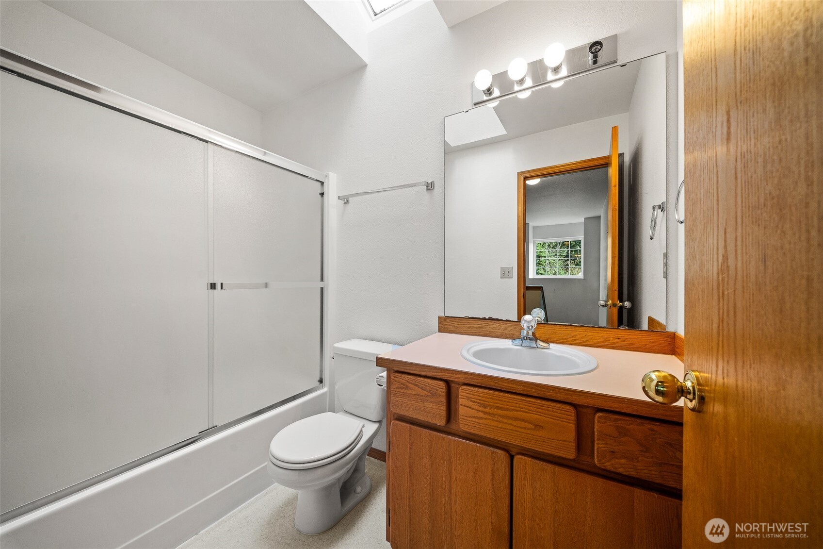 16011 Spanaway Loop Road South Spanaway, WA 98387 - Photo 25 of 35 a bathroom with a granite countertop sink toilet and shower