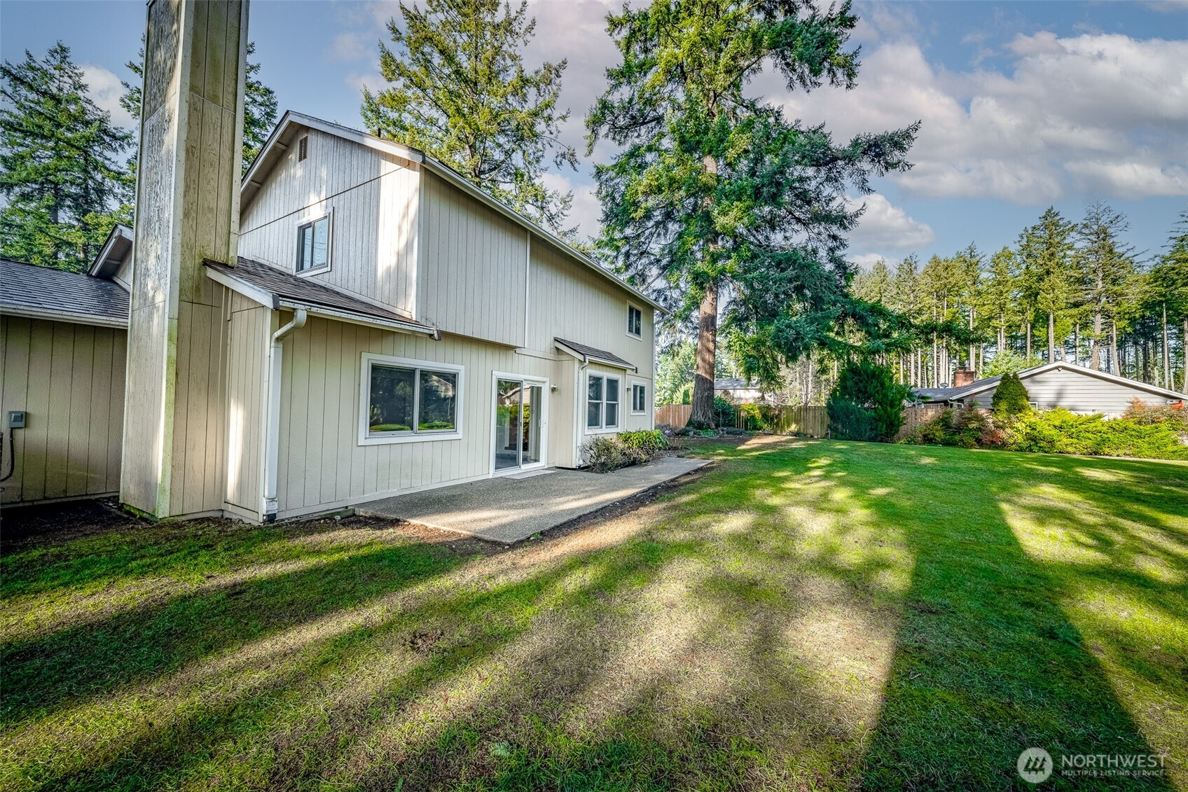 16011 Spanaway Loop Road South Spanaway, WA 98387 - Photo 27 of 35 a front view of a house with garden