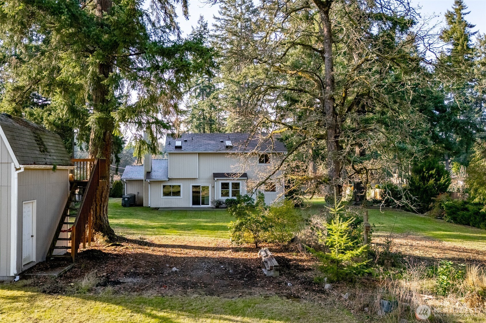 16011 Spanaway Loop Road South Spanaway, WA 98387 - Photo 31 of 35 a view of a house with a yard