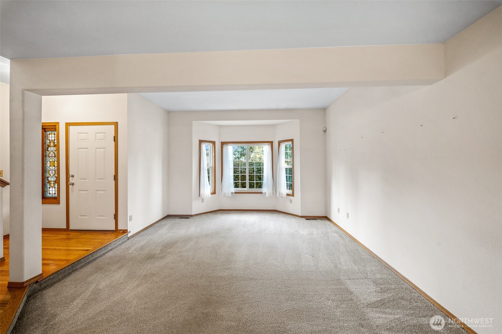 16011 Spanaway Loop Road South Spanaway, WA 98387 - Photo 4 of 35 an empty room with windows