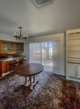 a room with furniture and window
