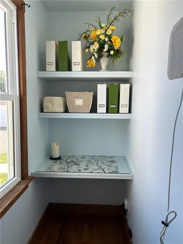 a view of a bathroom with tub and shower