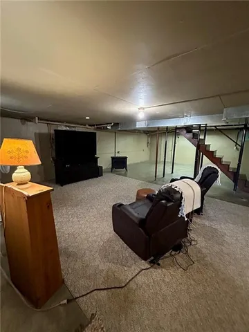 a outdoor dining space with furniture and stove