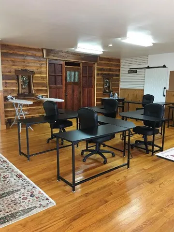 a bedroom with bed and a window