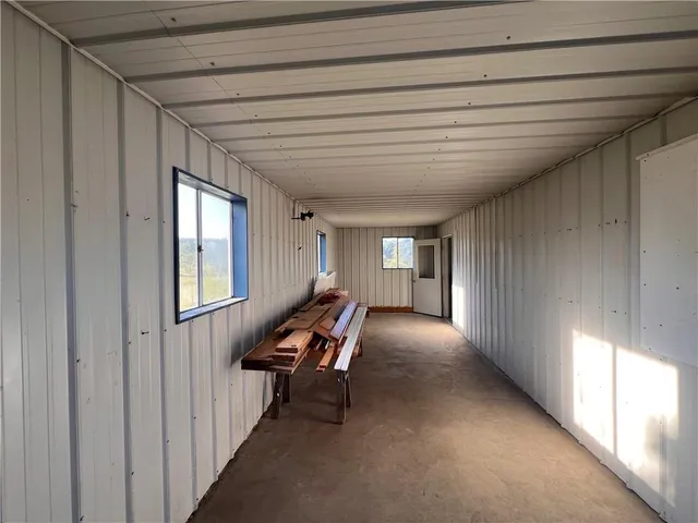 a view of an entryway with a chandelier