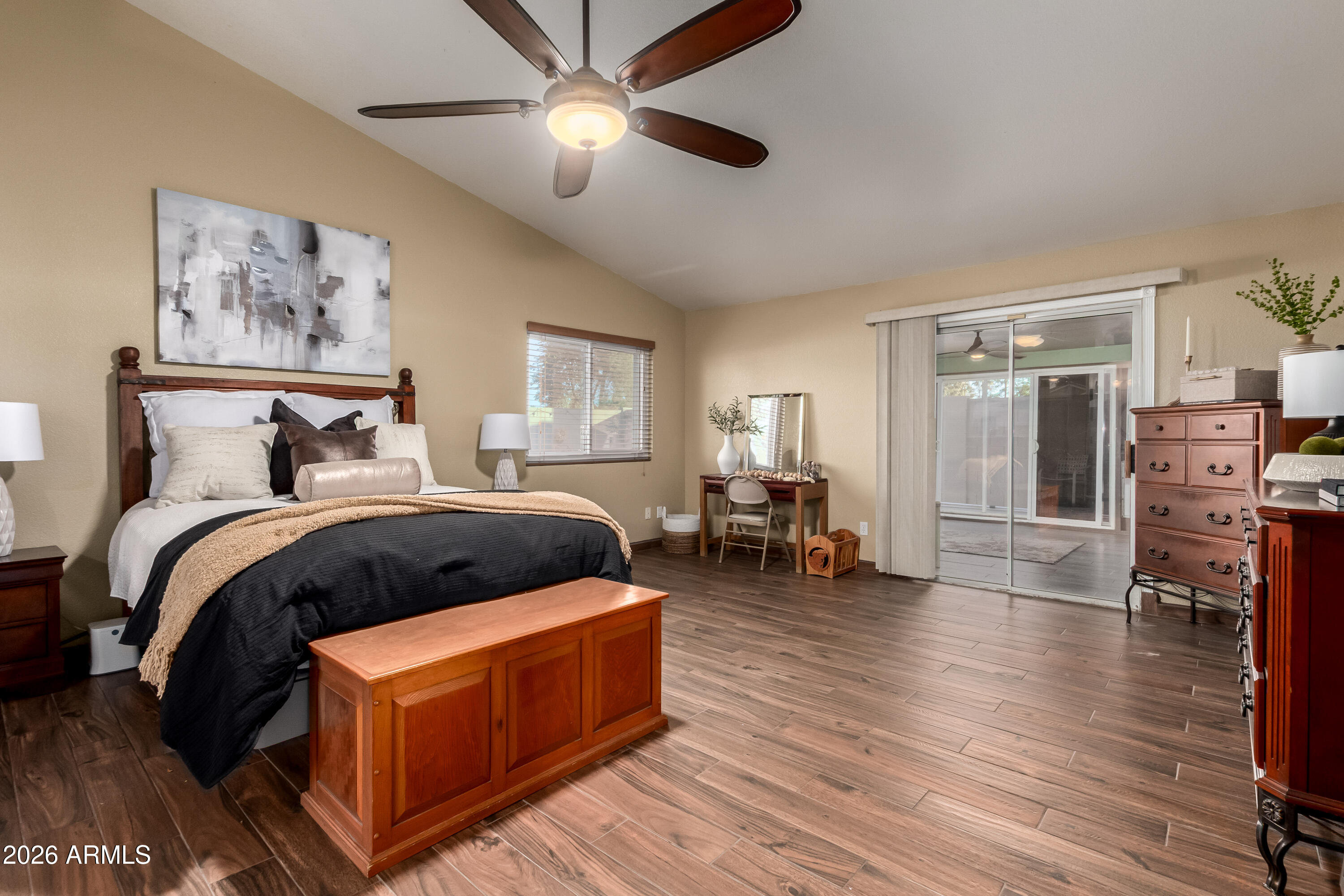 1147 North Marvin Street Gilbert, AZ 85233 - Photo 12 of 31 a bedroom with furniture and wooden floor