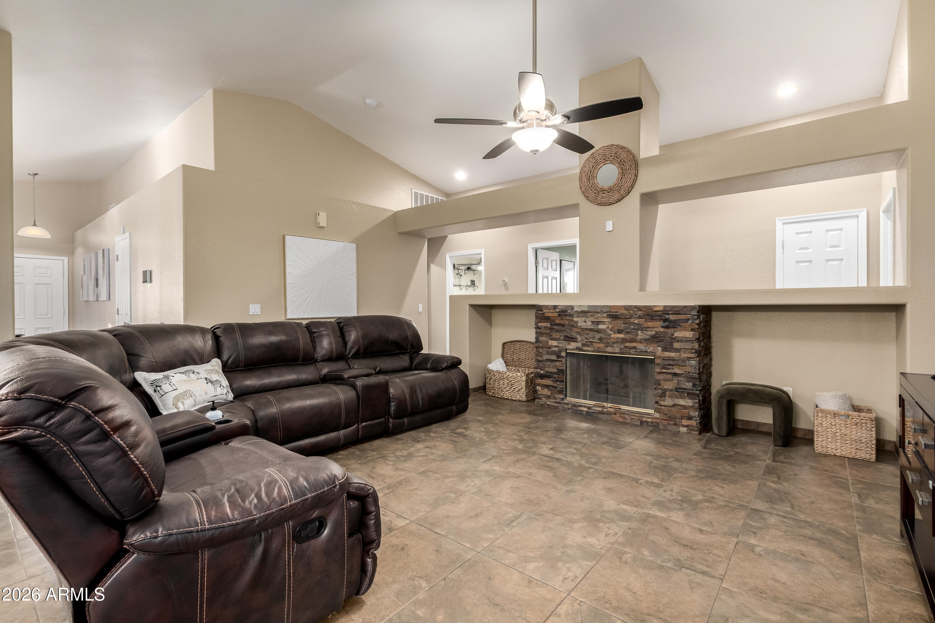 1147 North Marvin Street Gilbert, AZ 85233 - Photo 6 of 31 a view of a livingroom with furniture and a fireplace