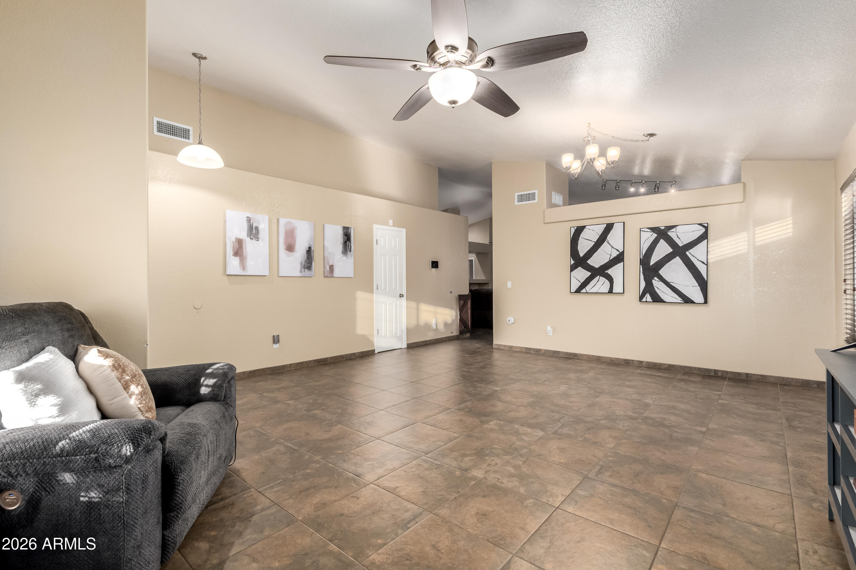 1147 North Marvin Street Gilbert, AZ 85233 - Photo 10 of 31 a view of a livingroom with furniture and ceiling fan