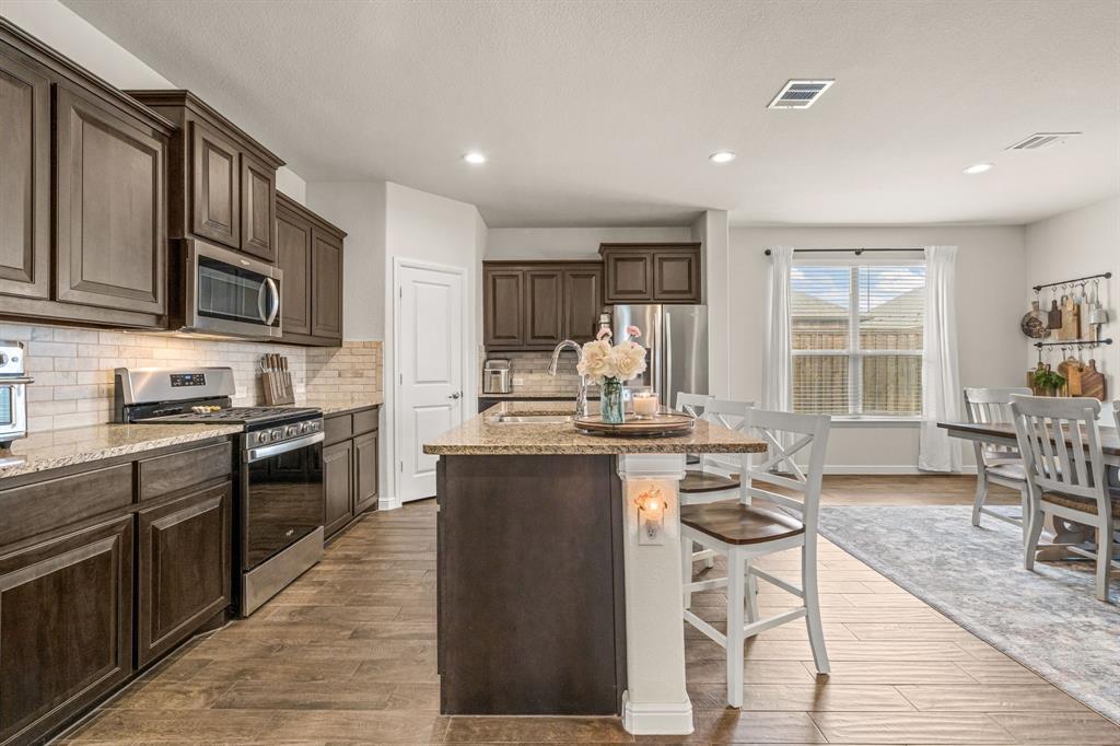 1443 Fox Hollow Road Krum, TX 76249 - Photo 9 of 39 Generous Kitchen as well!