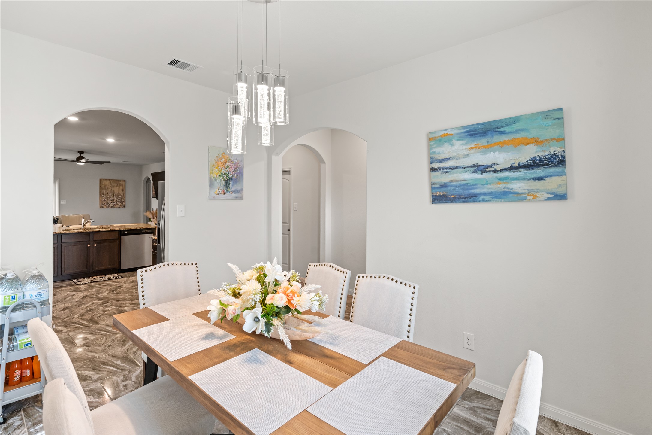 10731 Spring Brook Pass Drive Humble, TX 77396 - Photo 7 of 31 a view of a dining room with furniture and wooden floor