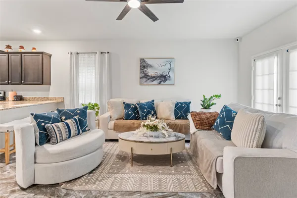 a living room with furniture and a couch