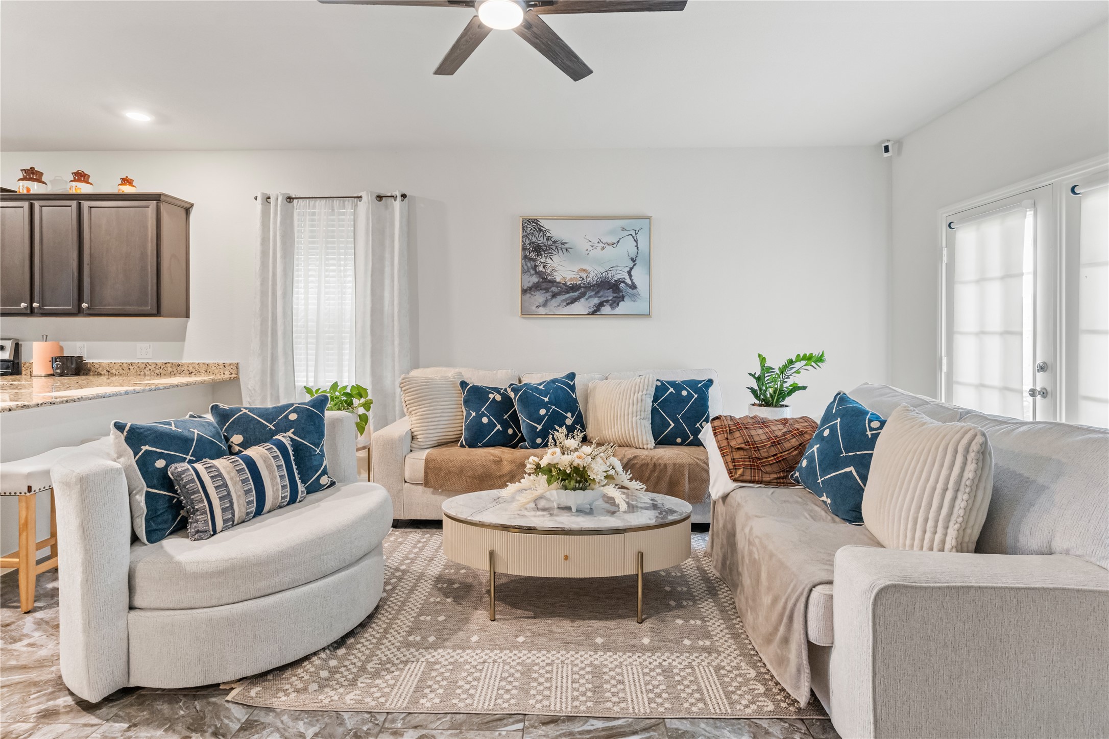 10731 Spring Brook Pass Drive Humble, TX 77396 - Photo 10 of 31 a living room with furniture and a couch