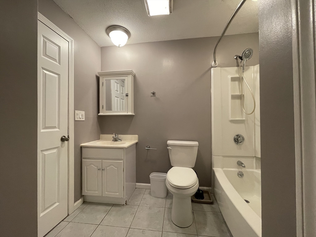 15 Carriage Lane Amherst, MA 01002 - Photo 11 of 23 a bathroom with a toilet sink and mirror
