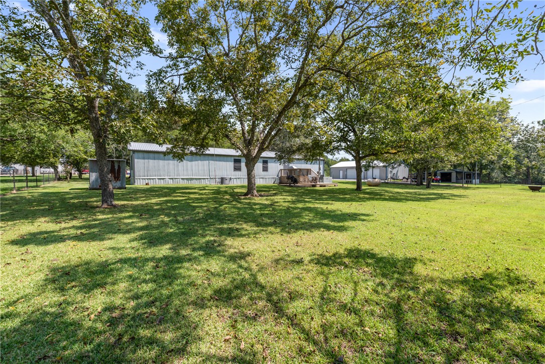 1061 Tafelski Road New Waverly, TX 77358 - Photo 26 of 37 a view of a volley ball court