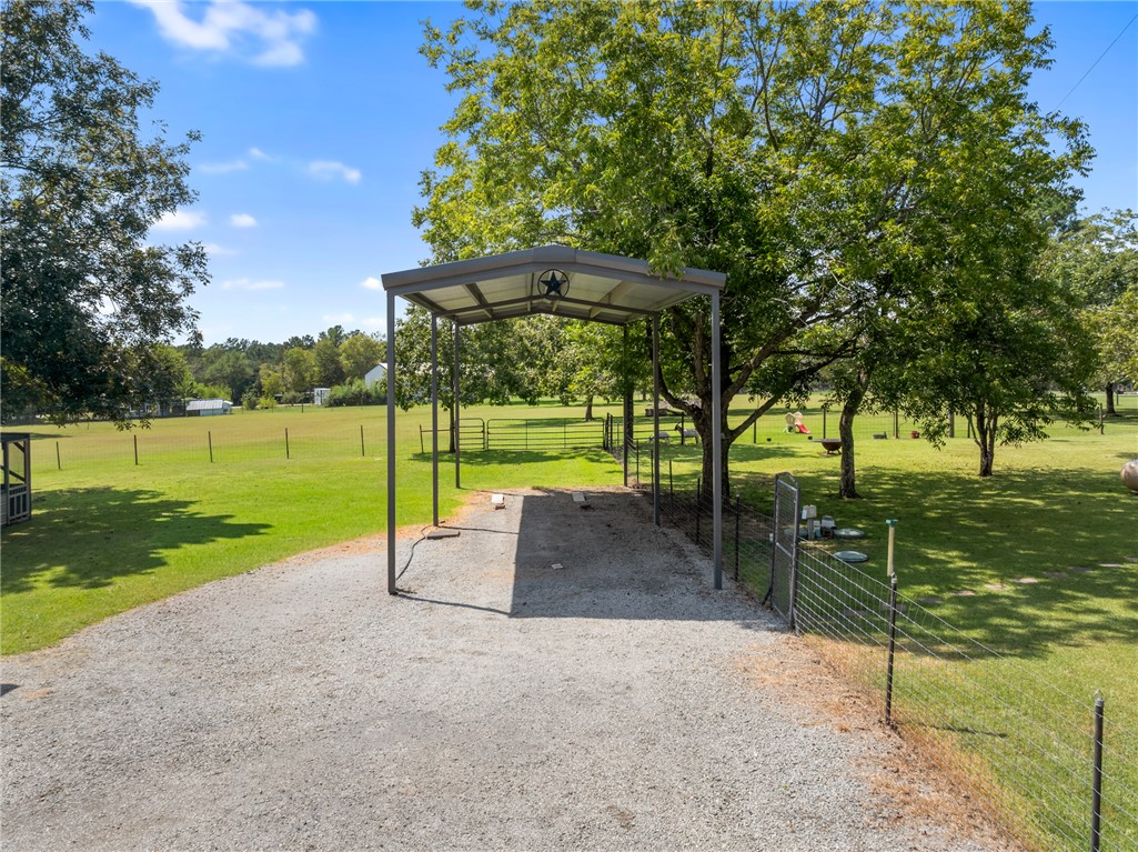 1061 Tafelski Road New Waverly, TX 77358 - Photo 30 of 37 a view of a park with large trees