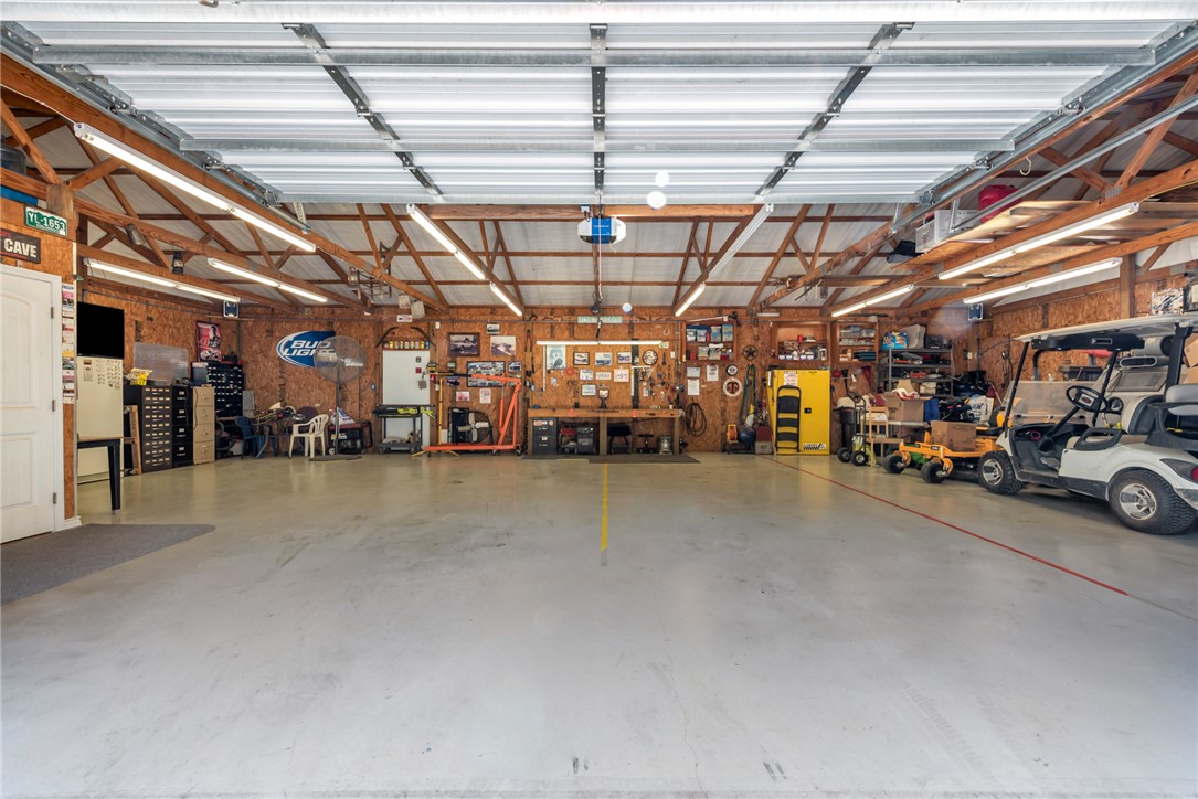 1061 Tafelski Road New Waverly, TX 77358 - Photo 31 of 37 a view of a room with storage and racks