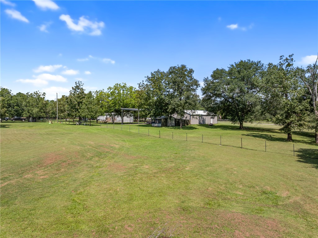 1061 Tafelski Road New Waverly, TX 77358 - Photo 37 of 37 a view of a swimming pool and outdoor space