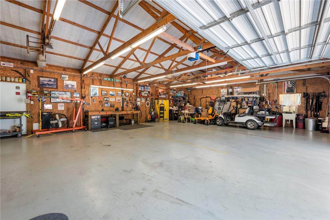 1061 Tafelski Road New Waverly, TX 77358 - Photo 4 of 37 a view of a garage with furniture