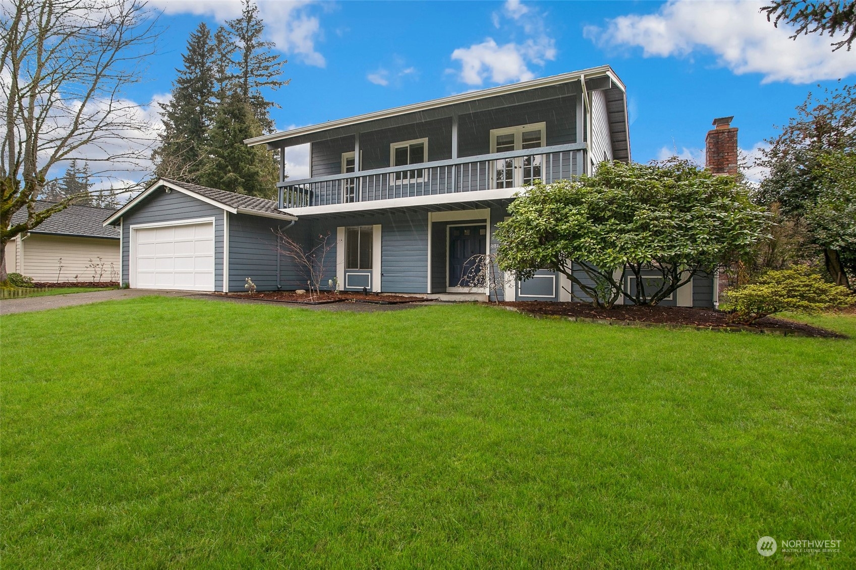 16810 143rd Avenue Southeast Renton, WA 98058 - Photo 1 of 38 a front view of house with yard and green space