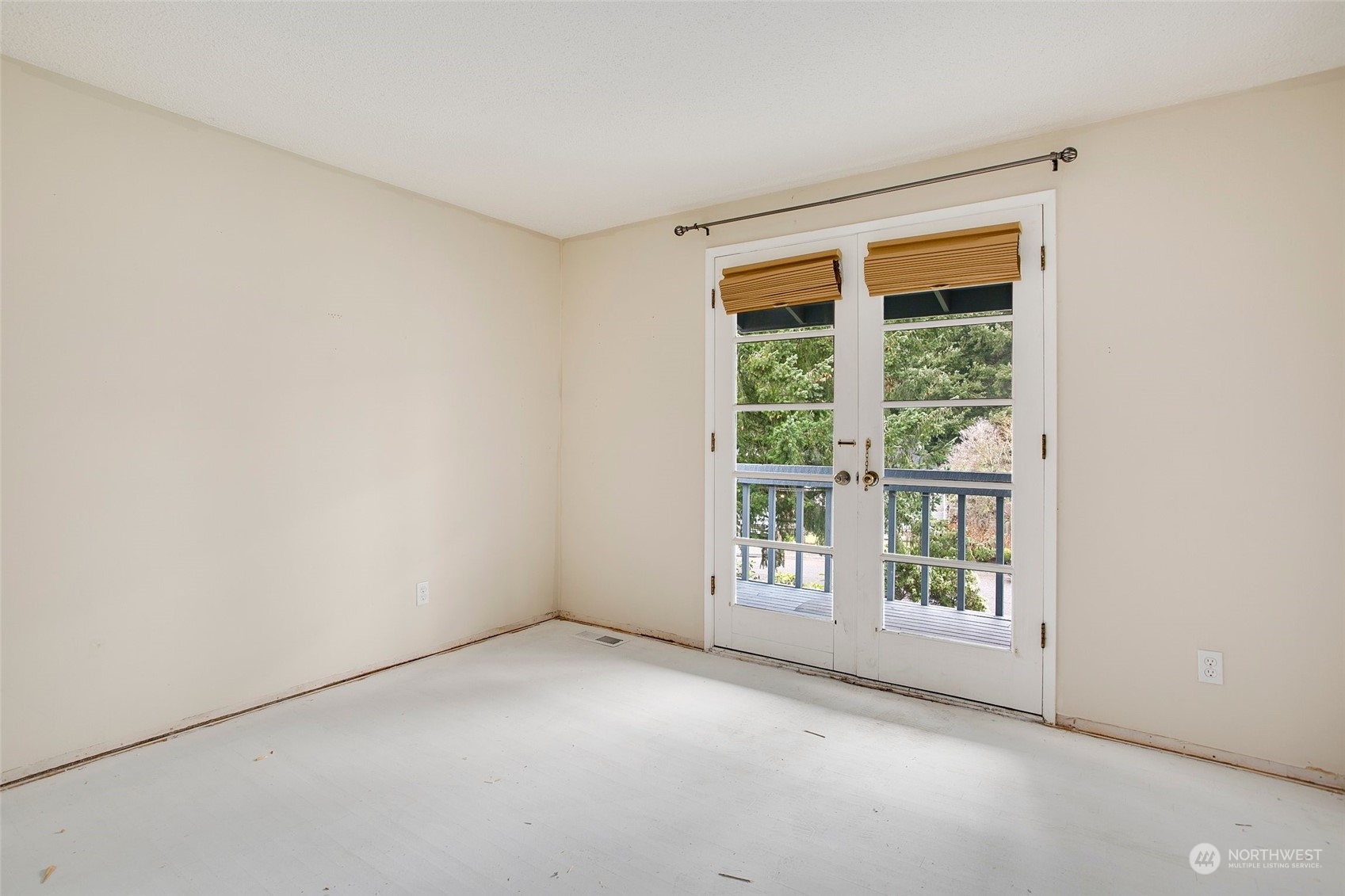 16810 143rd Avenue Southeast Renton, WA 98058 - Photo 19 of 38 an empty room with windows