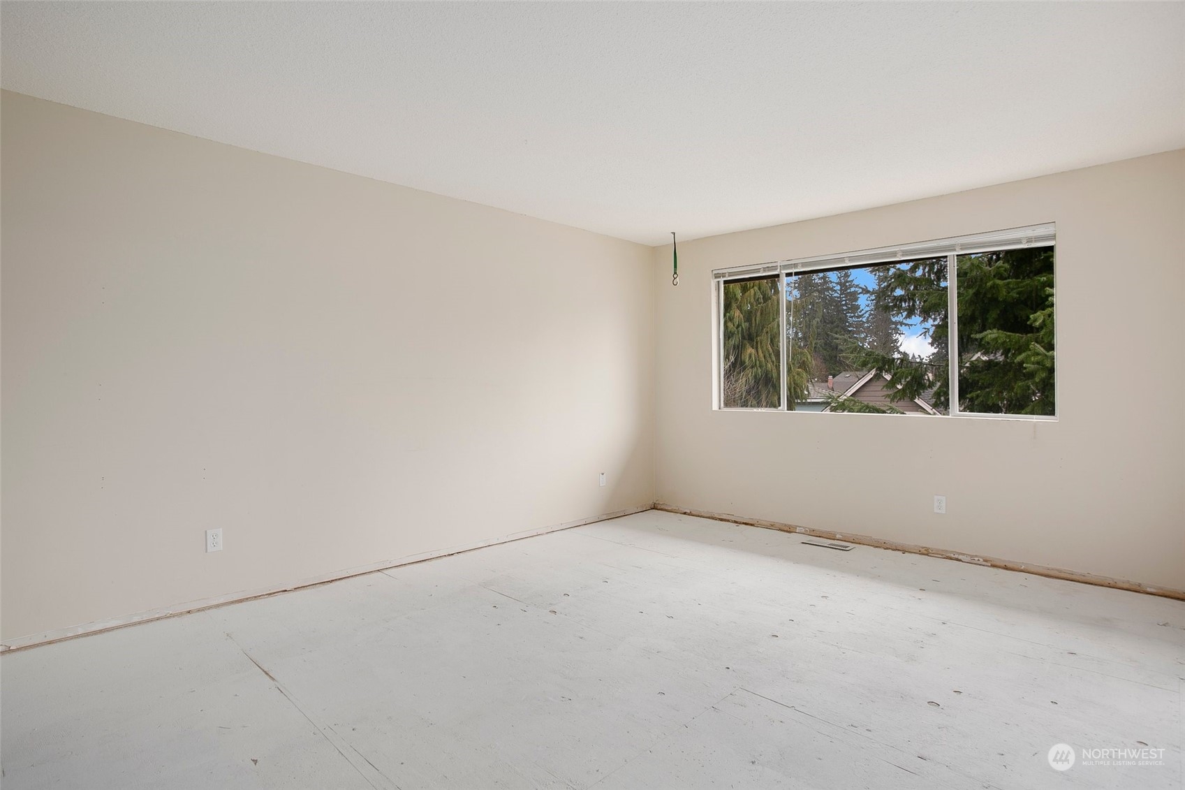 16810 143rd Avenue Southeast Renton, WA 98058 - Photo 20 of 38 an empty room with windows