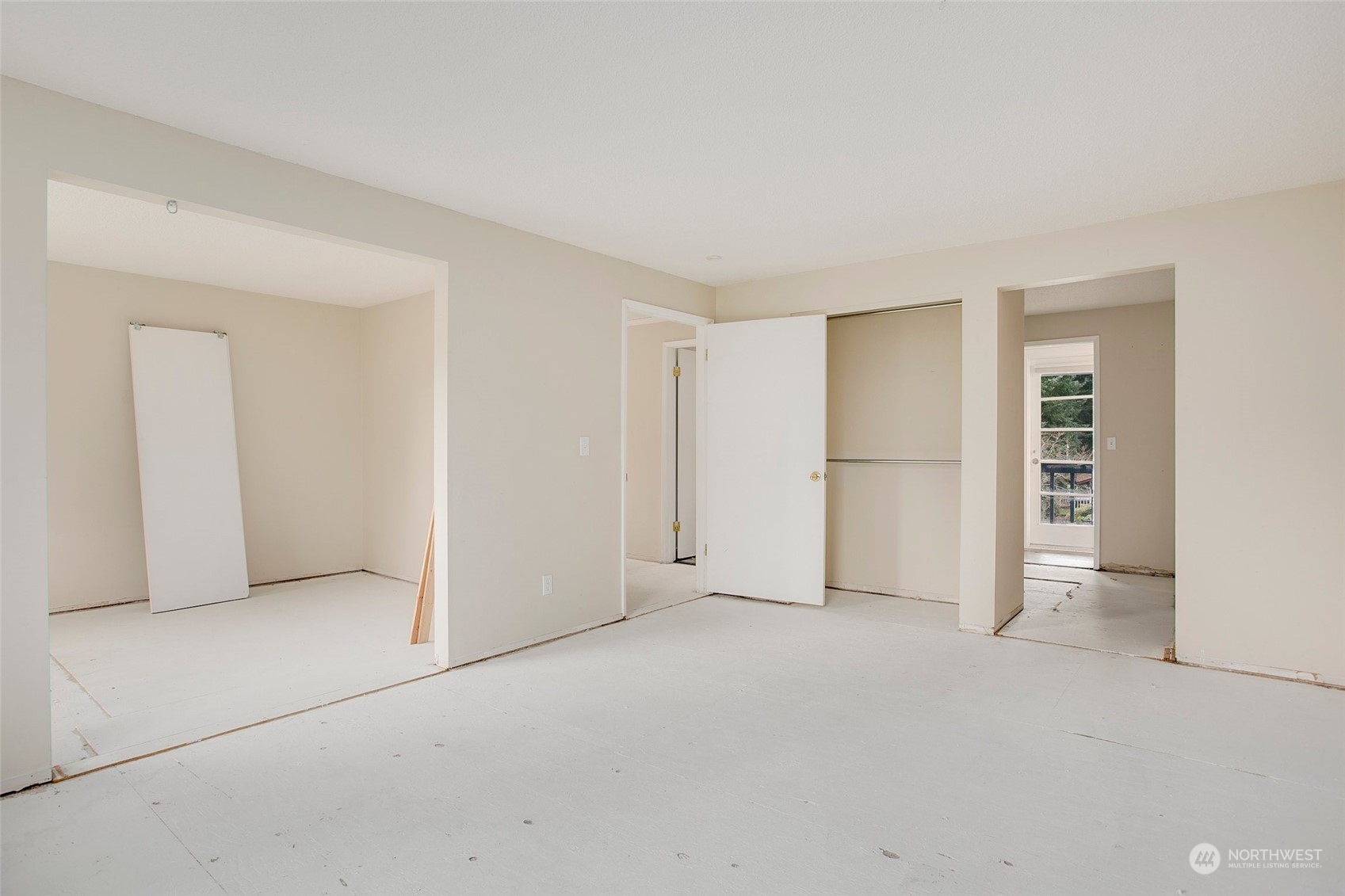 16810 143rd Avenue Southeast Renton, WA 98058 - Photo 22 of 38 an empty room with closet and natural light