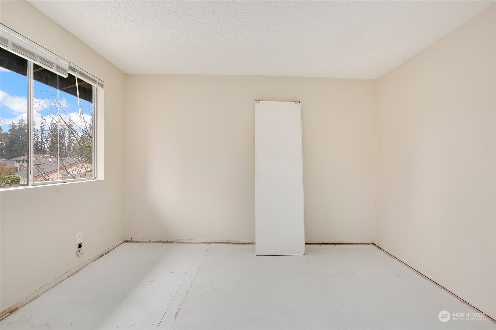 16810 143rd Avenue Southeast Renton, WA 98058 - Photo 23 of 38 an empty room with a window