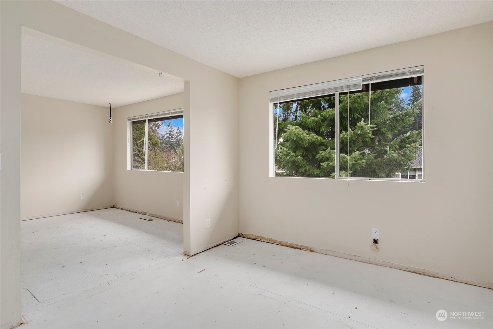 16810 143rd Avenue Southeast Renton, WA 98058 - Photo 24 of 38 an empty room with windows