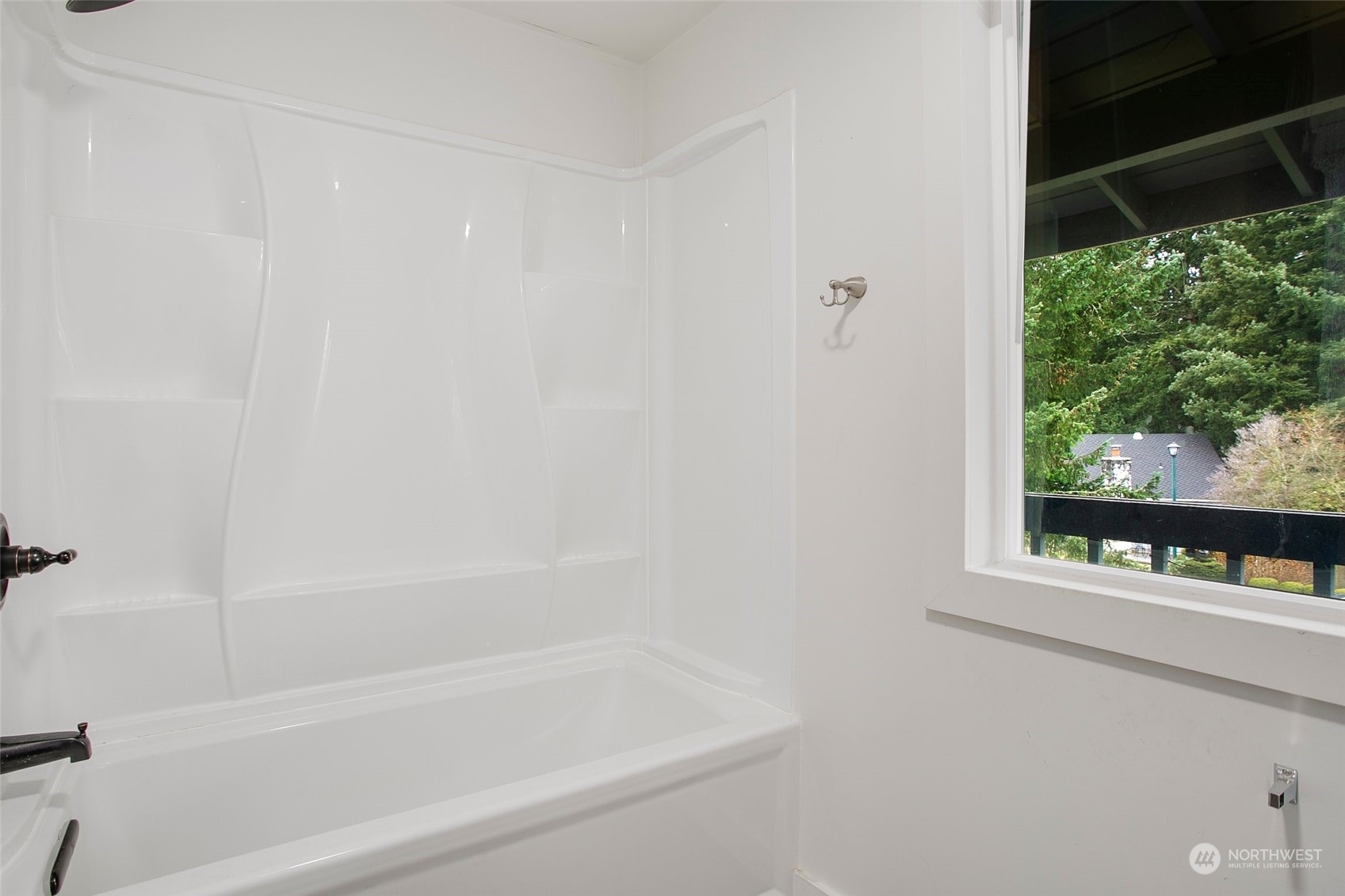 16810 143rd Avenue Southeast Renton, WA 98058 - Photo 26 of 38 a bathroom with a bathtub