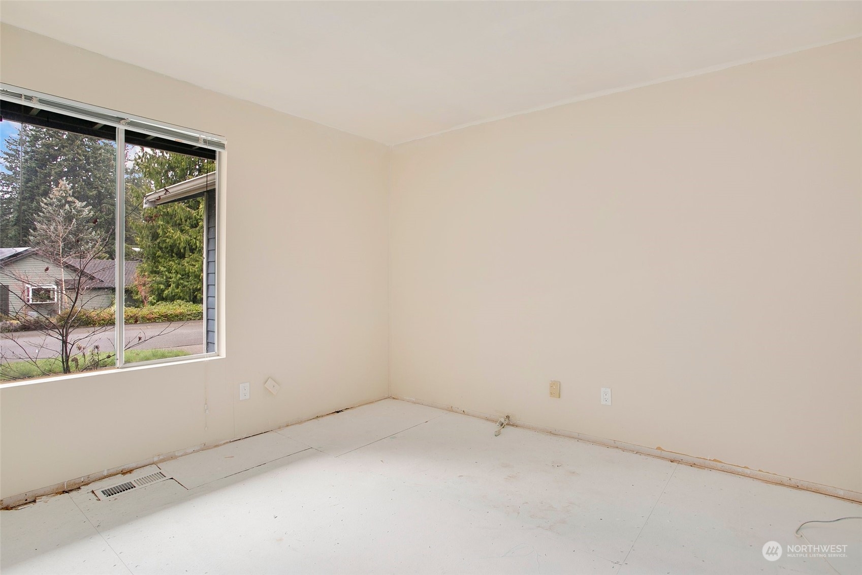 16810 143rd Avenue Southeast Renton, WA 98058 - Photo 29 of 38 an empty room with a window