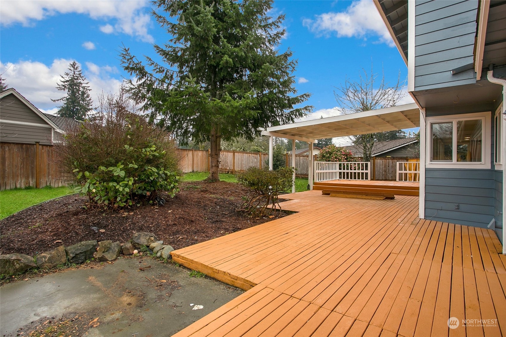 16810 143rd Avenue Southeast Renton, WA 98058 - Photo 33 of 38 a view of a house with backyard and sitting area