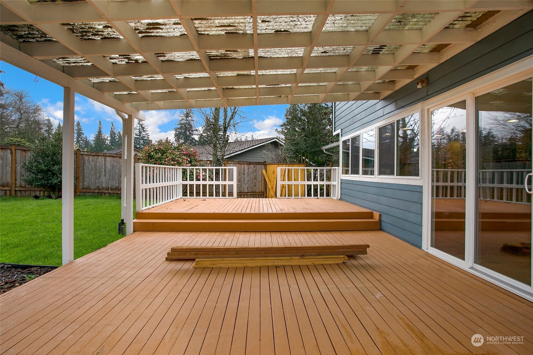 16810 143rd Avenue Southeast Renton, WA 98058 - Photo 35 of 38 a view of swimming pool with garden and patio