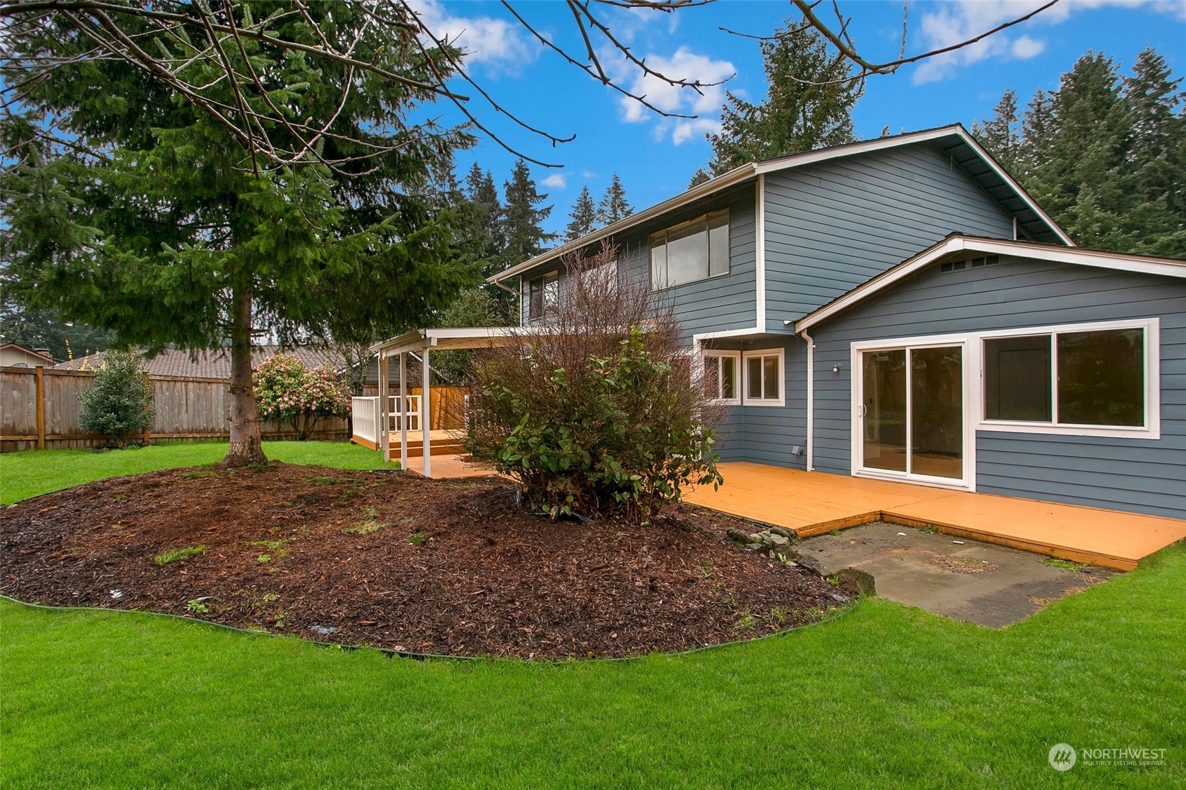 16810 143rd Avenue Southeast Renton, WA 98058 - Photo 37 of 38 a view of a house with a yard