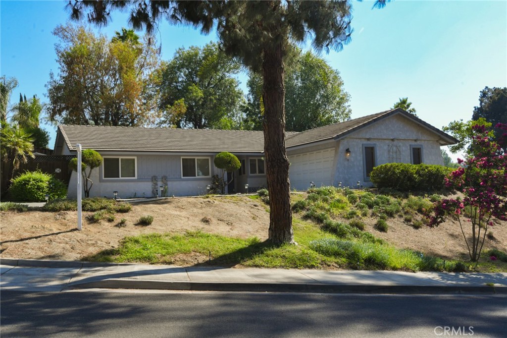 730 Vía Concepcion Riverside, CA 92506 - Photo 1 of 1 front view of a house with a yard