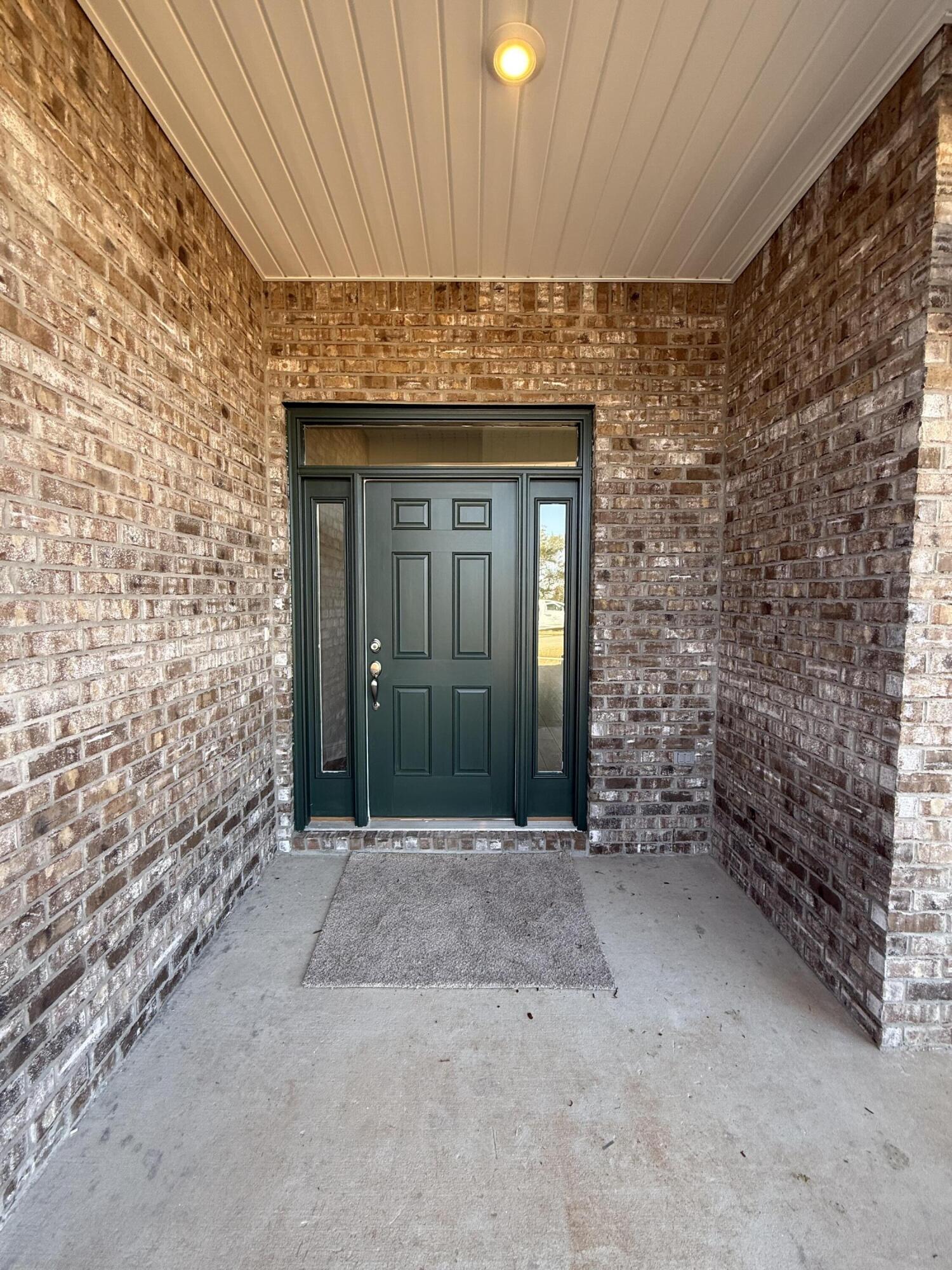 6011 Crocket Cove Crestview, FL 32539 - Photo 3 of 18 a view of entrance door of the house